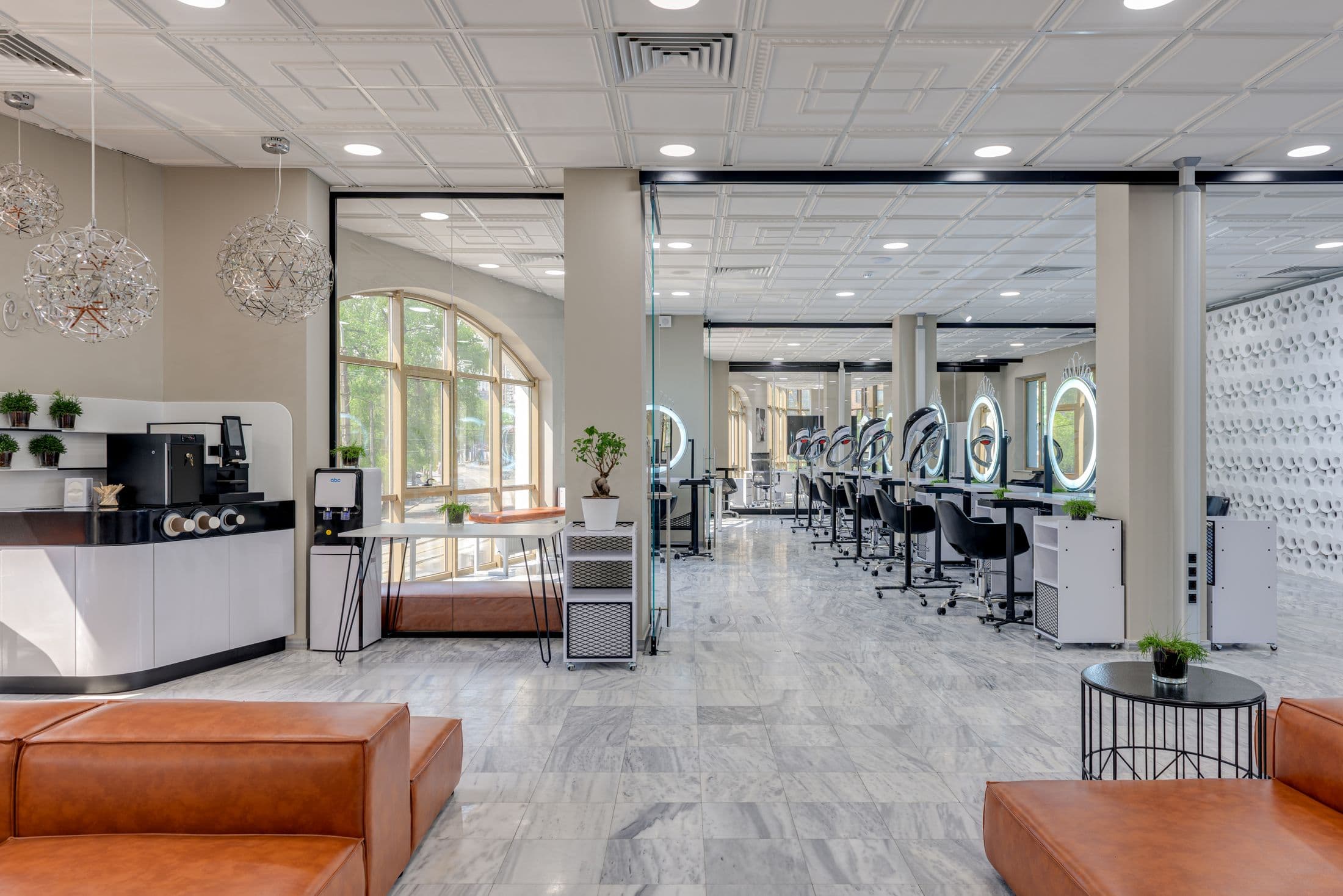 Bright, airy treatment lounge with soft seating at the Old Town Scottsdale studio